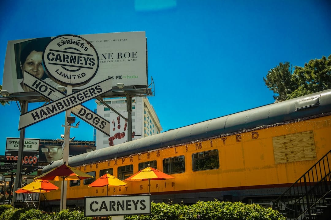 A yellow train carriage converted into a Canadian diner