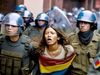 An AI generated image of a protestor being arrested in Colombia, credited to Amnesty International